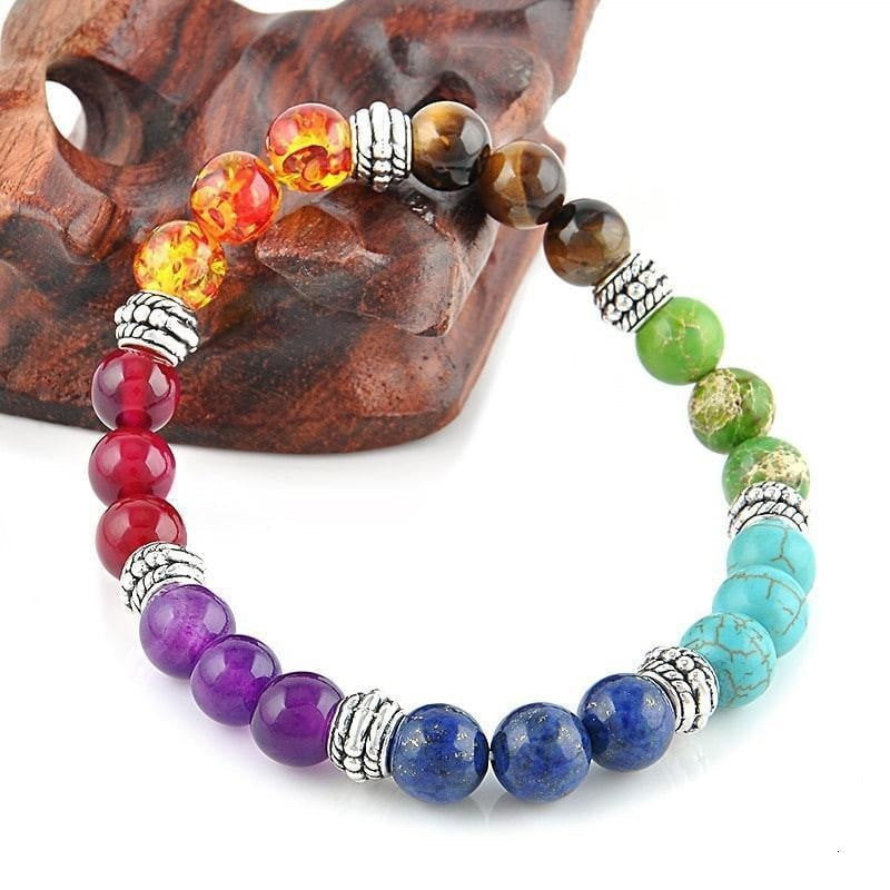 7 Chakra Crystals 8mm Bracelet On Small Wood